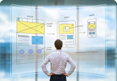 A professional man stands before a whiteboard showcasing a mobile app in a corporate design environment.